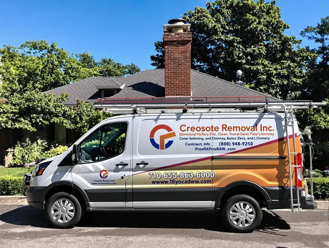 Fairfield Chimney Sweep technician removing creosote safely in Fairfield, CT